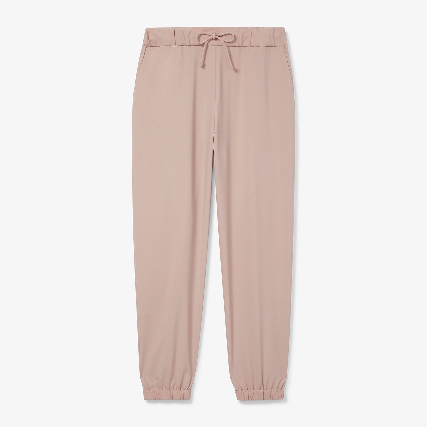 Front image of a woman wearing the Delaney jogger in Blush