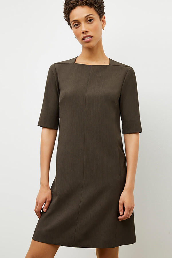 Front image of a woman wearing the emily dress in kale | Exclude | Grid