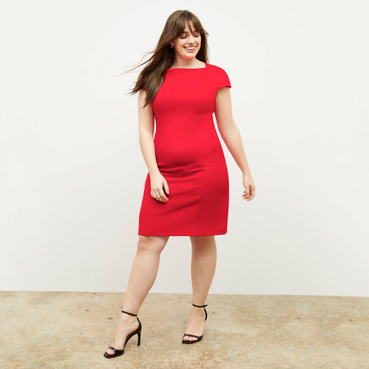 Front image of a woman wearing the ashley dress in flame | Lead