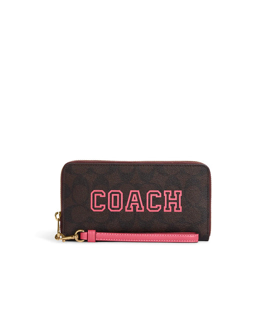 title:Coach Women's Long Zip Around Wallet In Signature Canvas With Varsity Motif;color:Brown / Watermelon