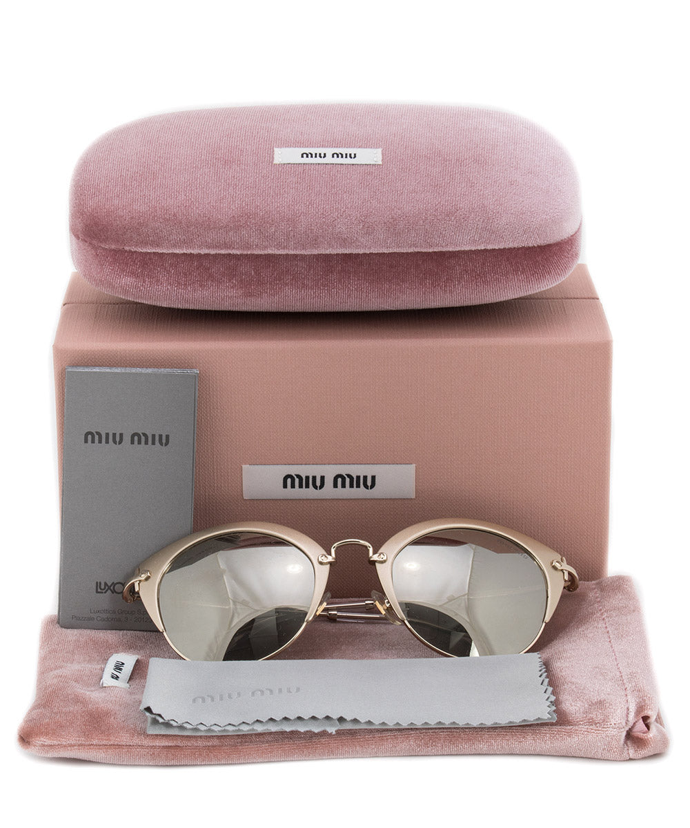 title:Miu Miu Cat Eye Sunglasses MU53RS VAF1C0 52;color:Gold